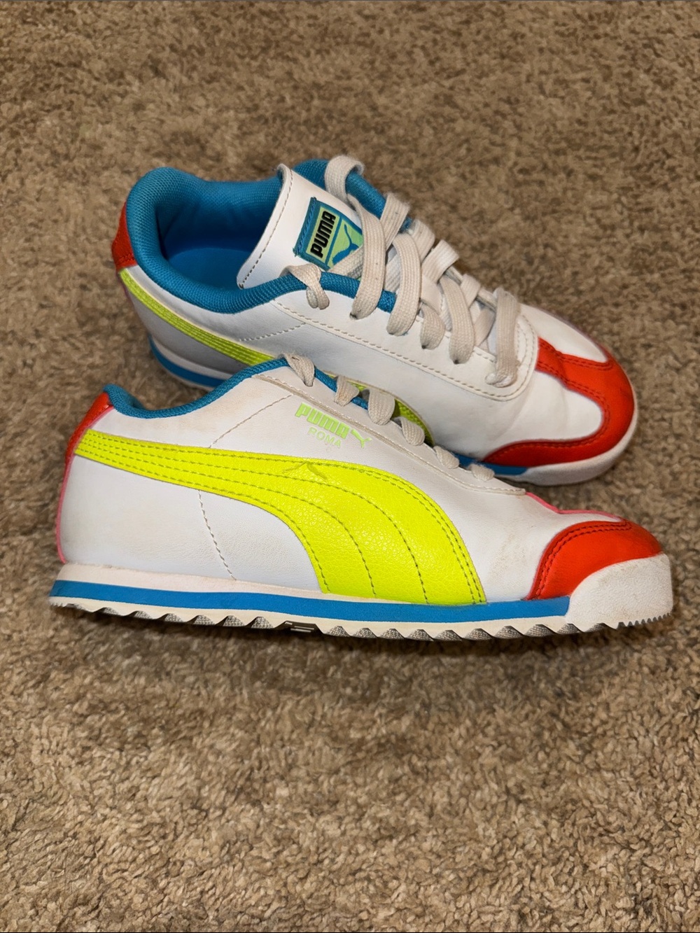 Puma Kids White Sneakers with Neon Yellow, Orange & Blue Accents